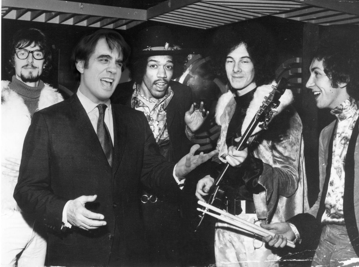 With Noel Redding and Mitch Mitchell. Three faces already in frame, and room made for a fourth.