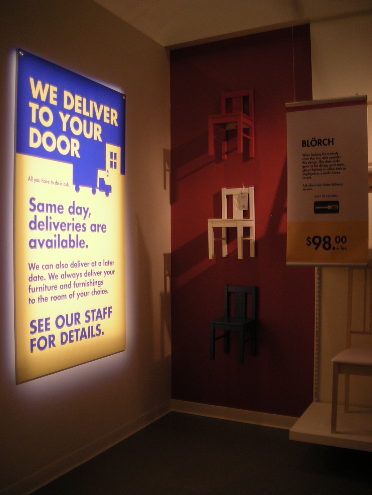 Wall panels, hanging banners and product cards, all in a house style that could not be named.